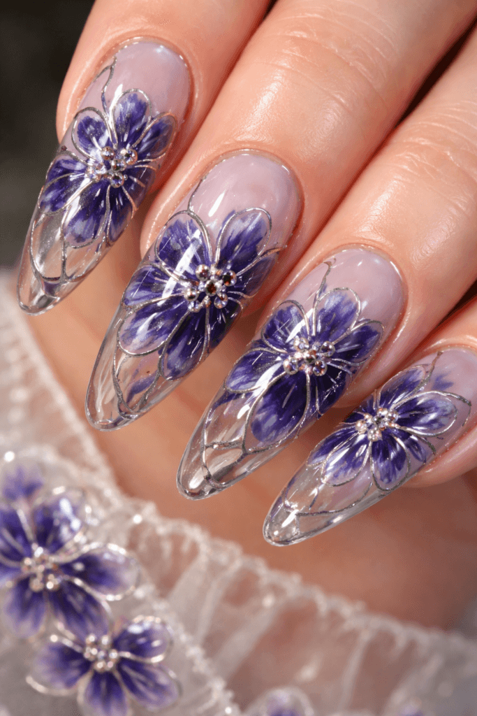 glass nails floral cloisonné with indigo iris petals and platinum outlines over blush-smoke base, platinum micro-dots