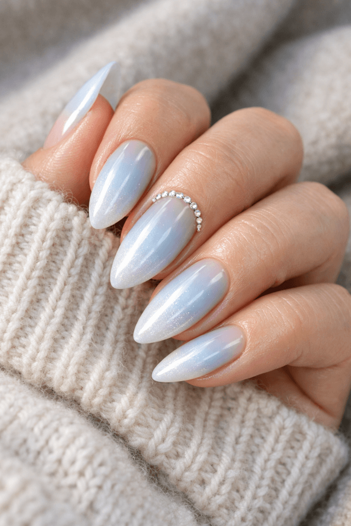 icy blue soft glam nails with rhinestones